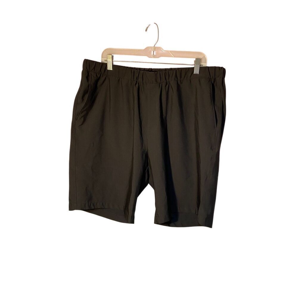 Greg Norman men’s flat front elastic waist, golf shorts, size XL ￼